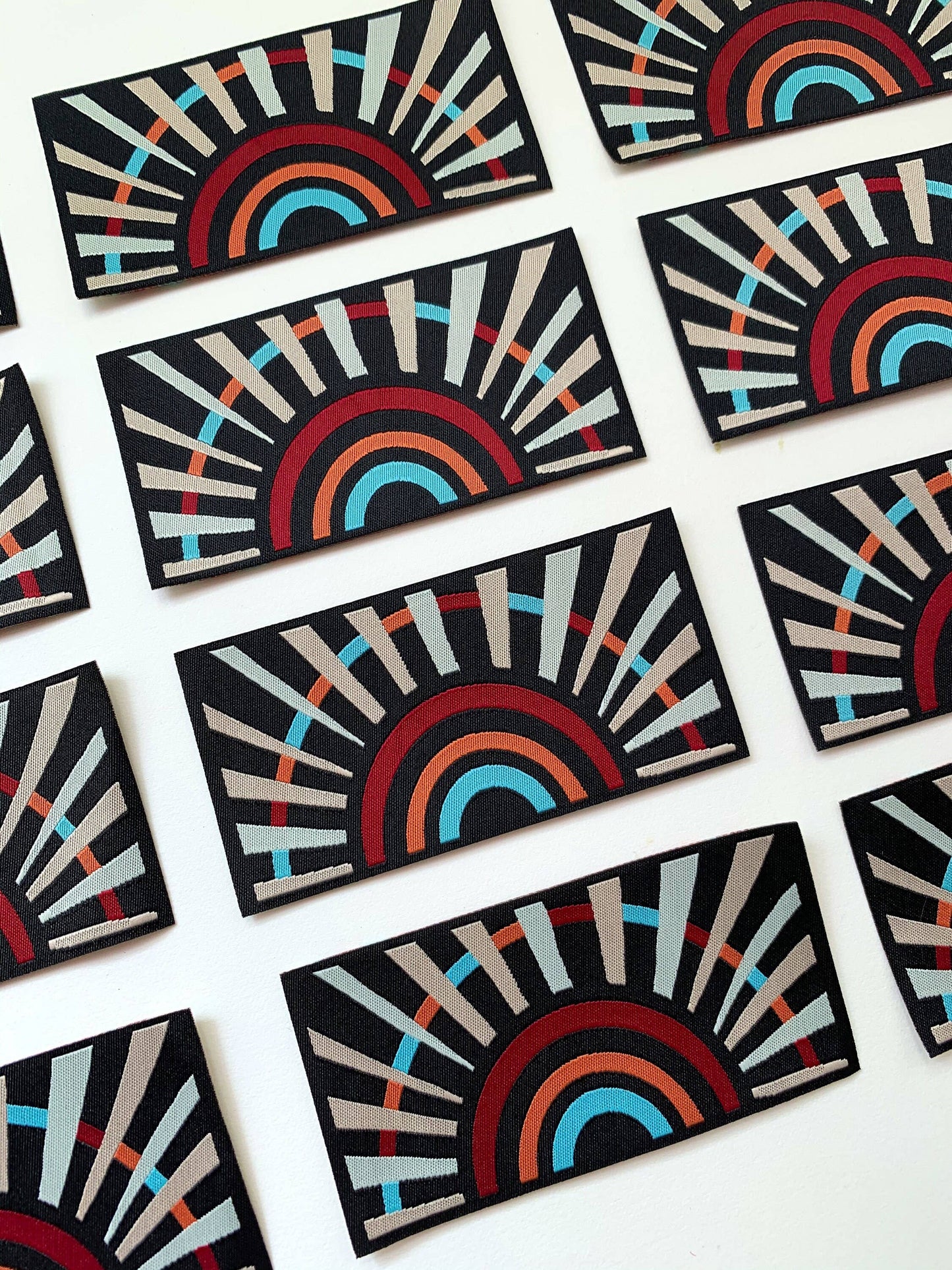Black Sunbow - Woven Iron-On Patch
