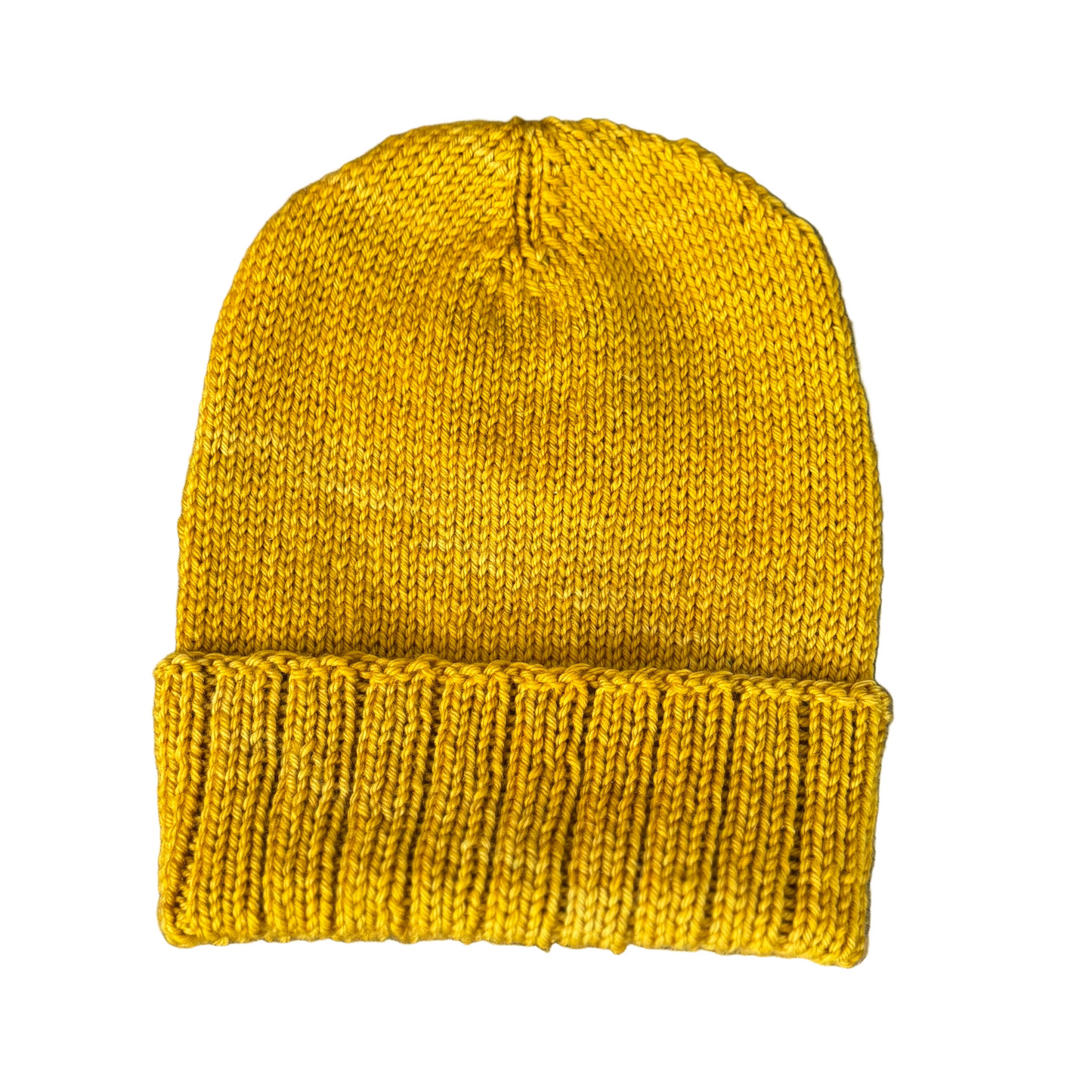 mustard yellow knit hat with a folded ribbed brim on a white background.
